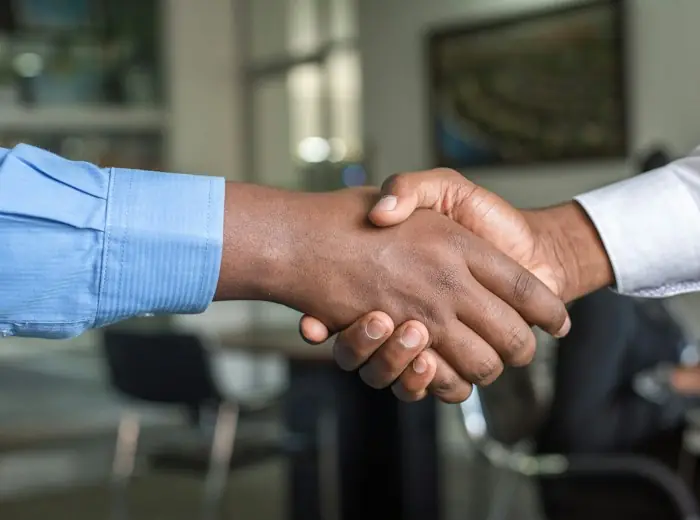 A handshake during a meeting